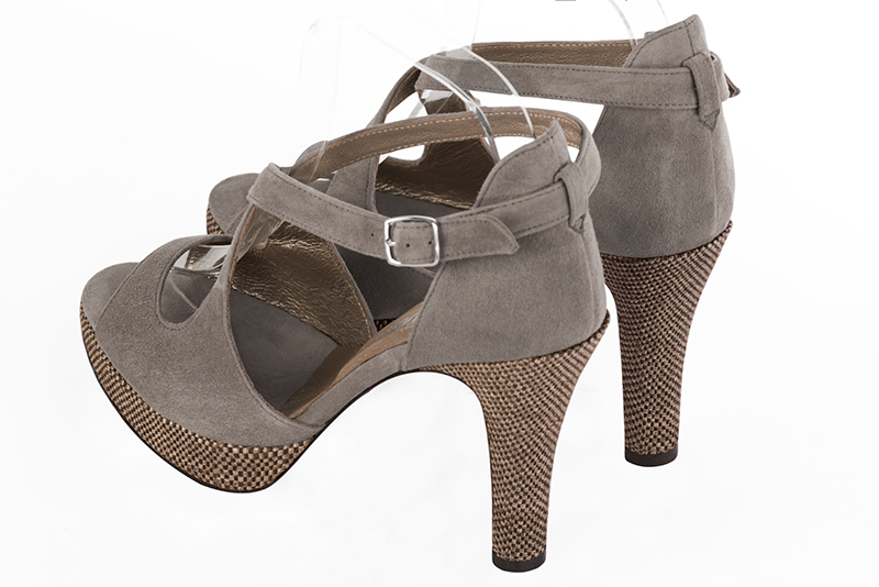 Bronze beige women's closed back sandals, with crossed straps. Round toe. Very high slim heel with a platform at the front. Rear view - Florence KOOIJMAN
